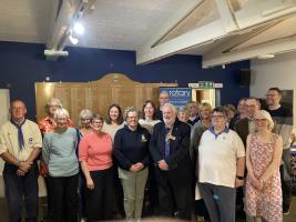Nineteen grant recipients at the Rotary SwiMarathon 2026 presentation evening with president Les Dodd